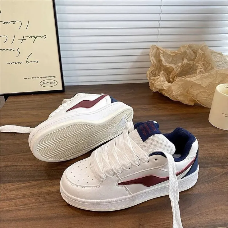 Women's low top mid heel pump shoes in synthetic leather, available in pink colour, side view