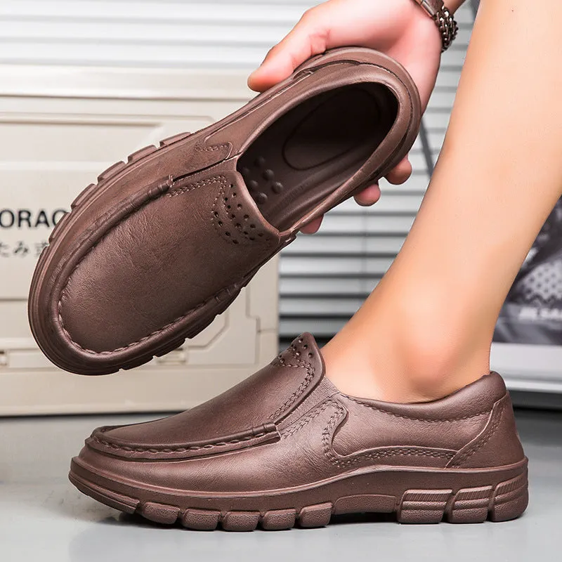 Men's black leather slip-on shoe with a mid-top design and platform sole