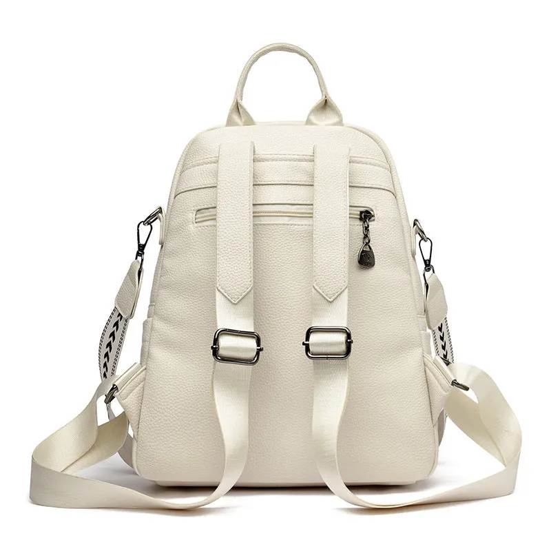 Genuine leather geometric patchwork student backpack with metal belt decoration, waterproof and wear-resistant, in black beige and yellow