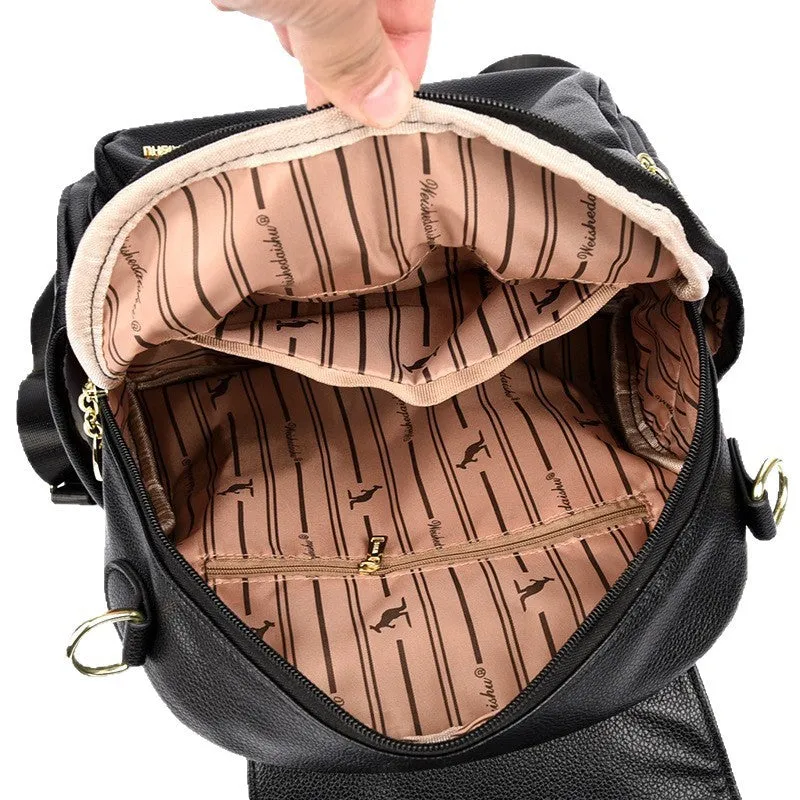Genuine leather backpack with pendant and spliced belt detail for students and travellers, available in beige