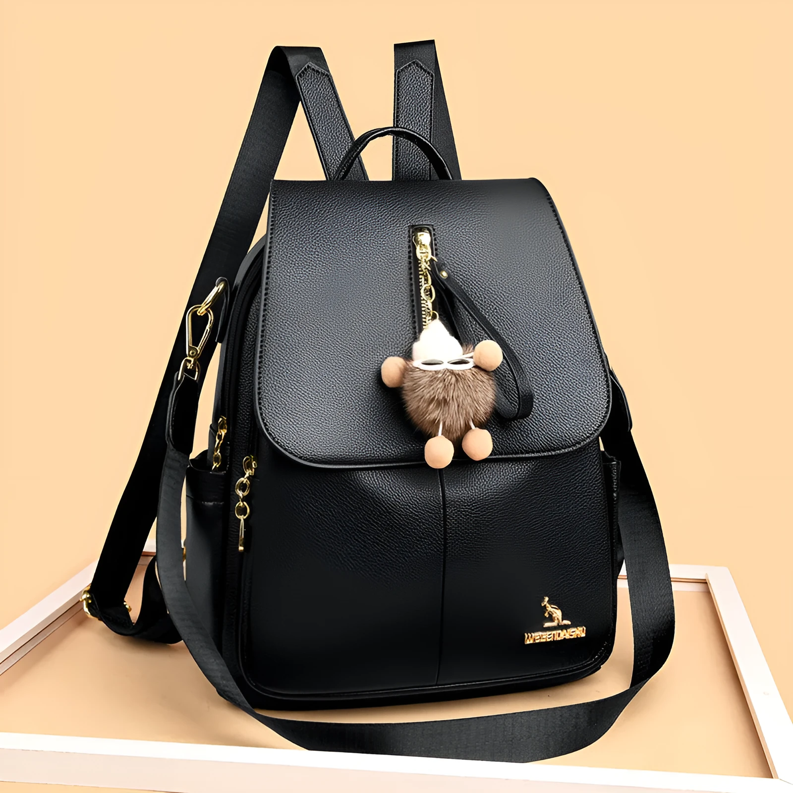 Genuine leather backpack with pendant and spliced belt detail for students and travellers, available in beige