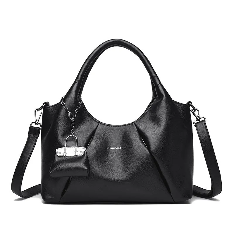 Trendy niche women's new shoulder bag in genuine leather with dumpling shape and pleated detail, khaki colour
