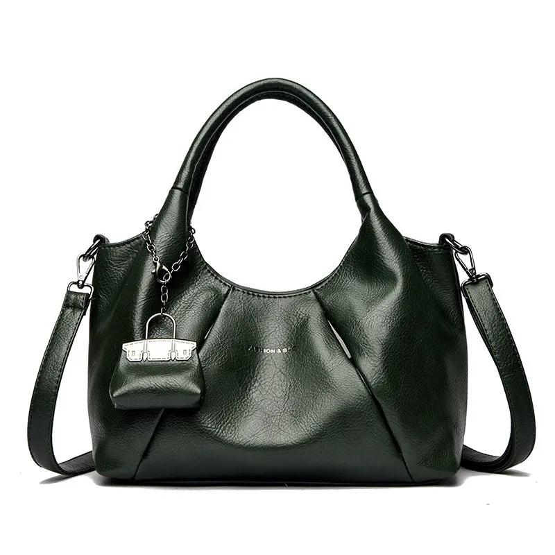 Trendy niche women's new shoulder bag in genuine leather with dumpling shape and pleated detail, khaki colour
