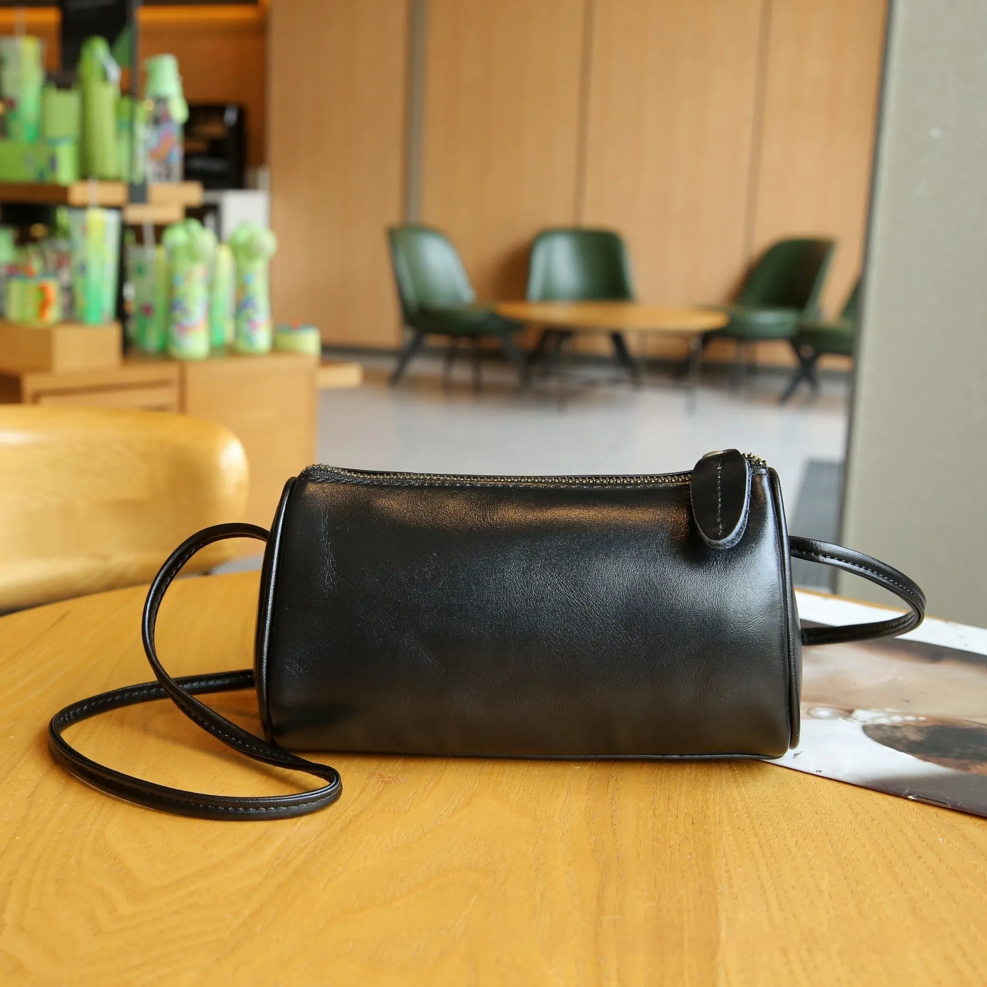 Genuine leather women's pillow crossbody bag in black, 20cm by 8cm by 15cm, with inner patch pocket, retro style