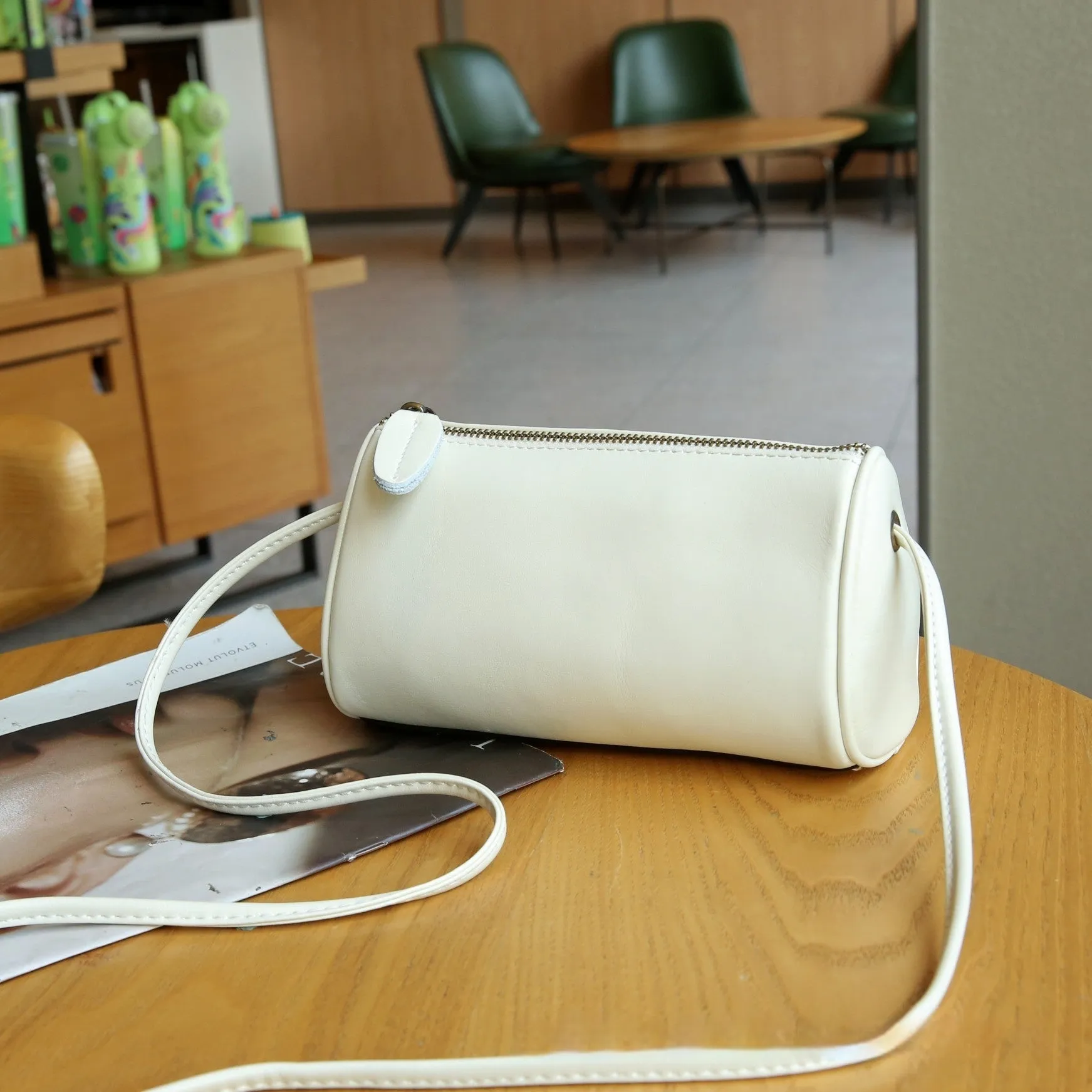 Genuine leather women's pillow crossbody bag in black, 20cm by 8cm by 15cm, with inner patch pocket, retro style