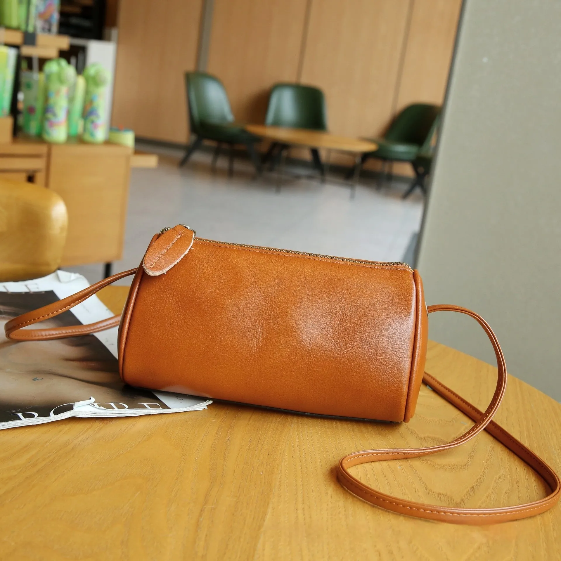 Genuine leather women's pillow crossbody bag in black, 20cm by 8cm by 15cm, with inner patch pocket, retro style