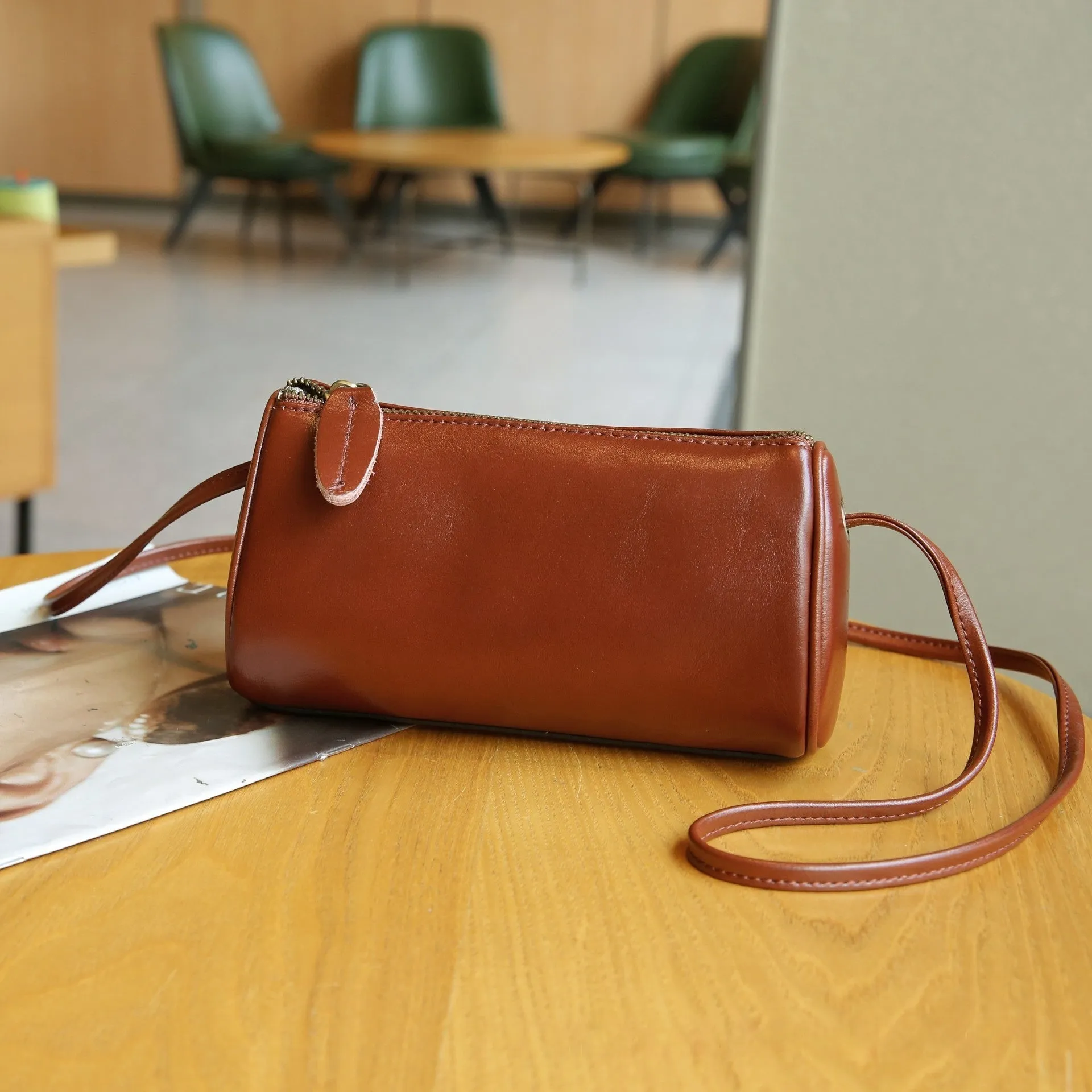 Genuine leather women's pillow crossbody bag in black, 20cm by 8cm by 15cm, with inner patch pocket, retro style