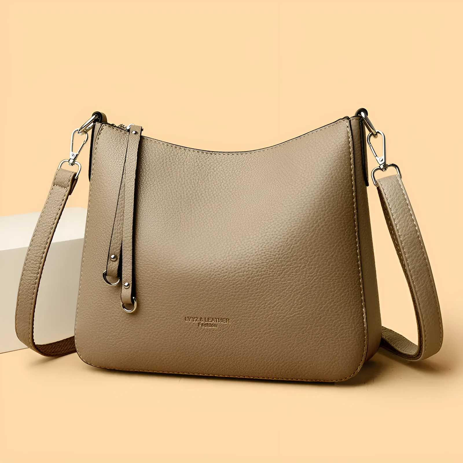 Genuine leather crossbody bag with metal belt decoration, horizontal square shape, available in khaki and other colours