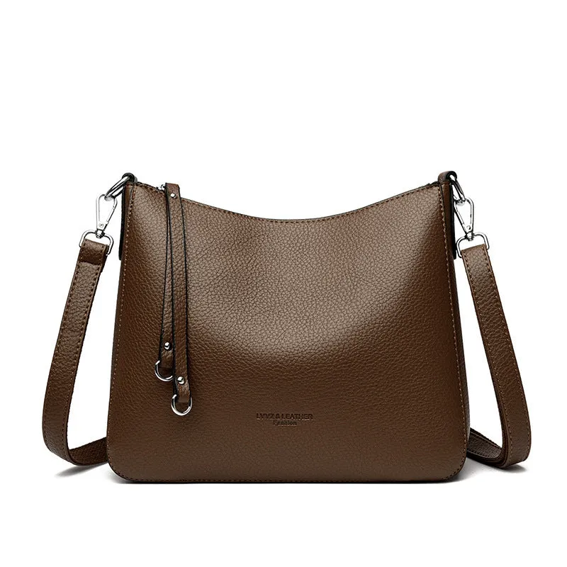 Genuine leather crossbody bag with metal belt decoration, horizontal square shape, available in khaki and other colours
