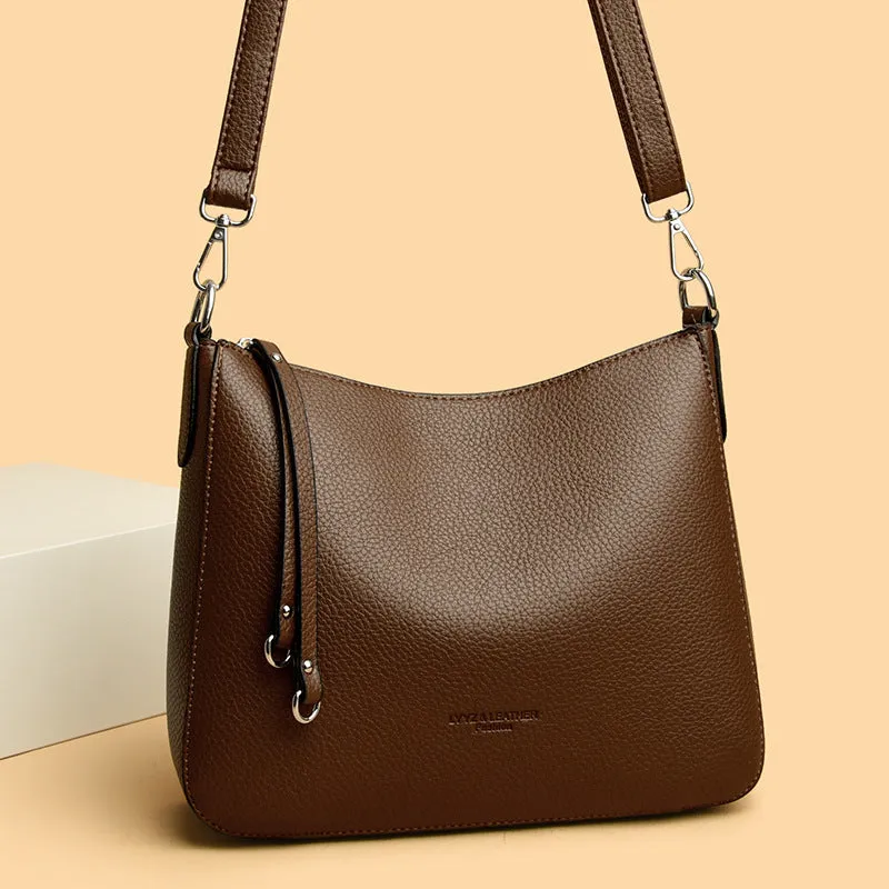 Genuine leather crossbody bag with metal belt decoration, horizontal square shape, available in khaki and other colours