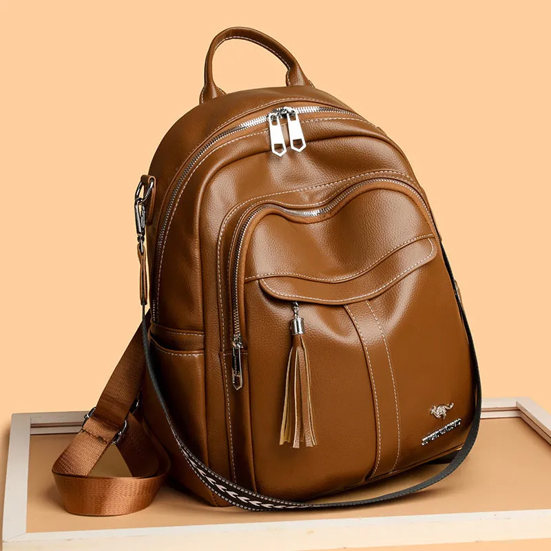 Genuine leather hand-held tassel backpack in khaki with stitching and fringe detail