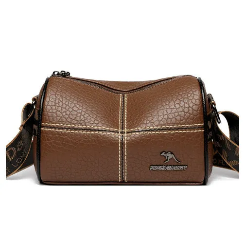 Women's casual stitched genuine leather shoulder bag in cylindrical shape, available in black, brown, green, and white