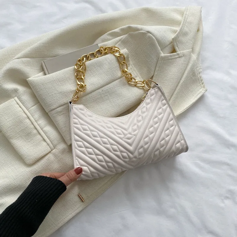 Brown pleated PU chain baguette shoulder bag showing square shape and soft handles.