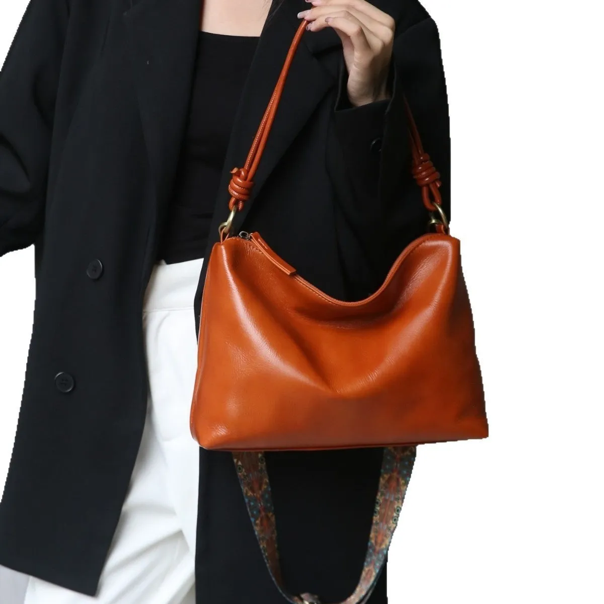 Genuine leather creative large capacity pillow-shaped shoulder bag in black with double straps and top grain leather finish