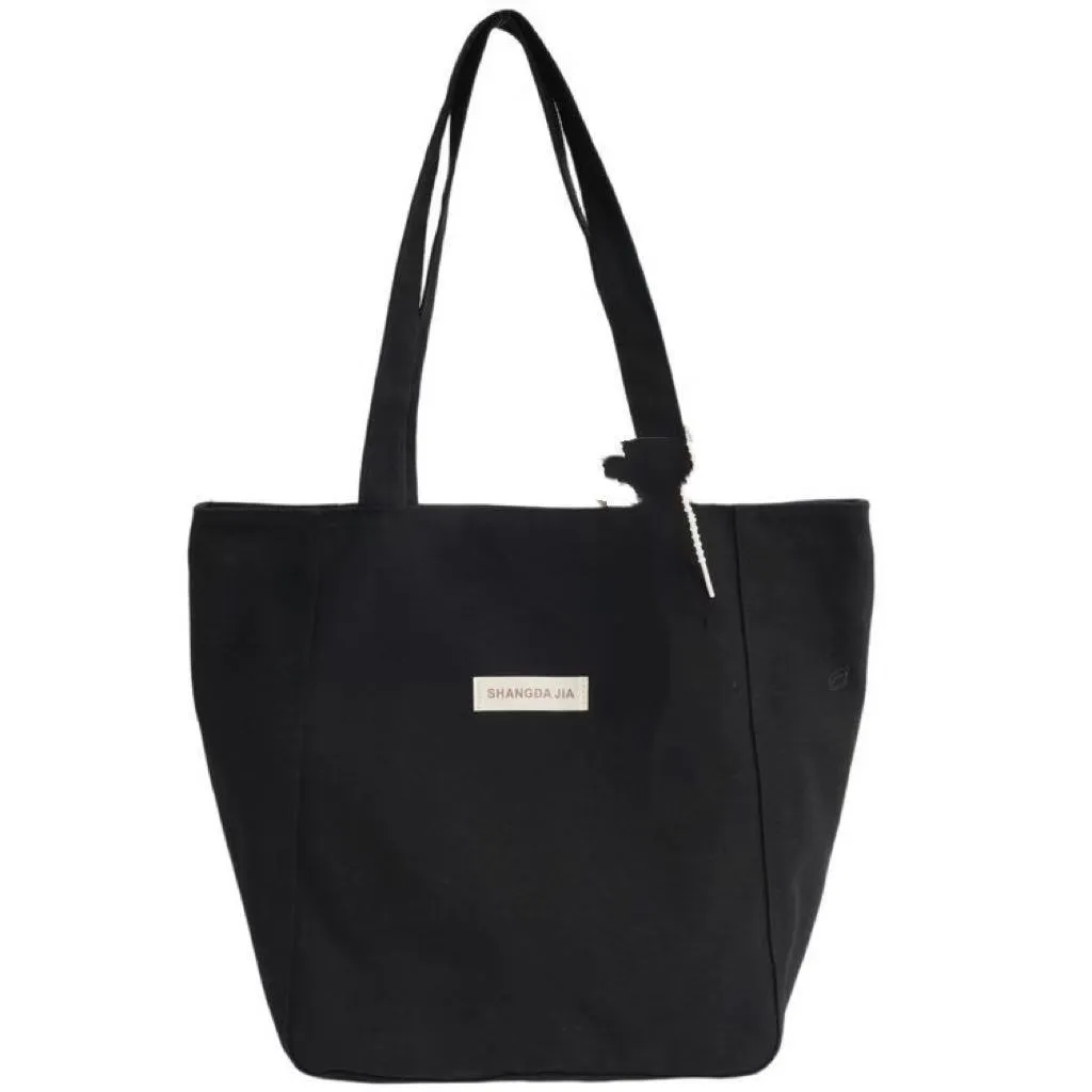 Canvas casual large capacity shoulder bag for women in four colours with pendant options