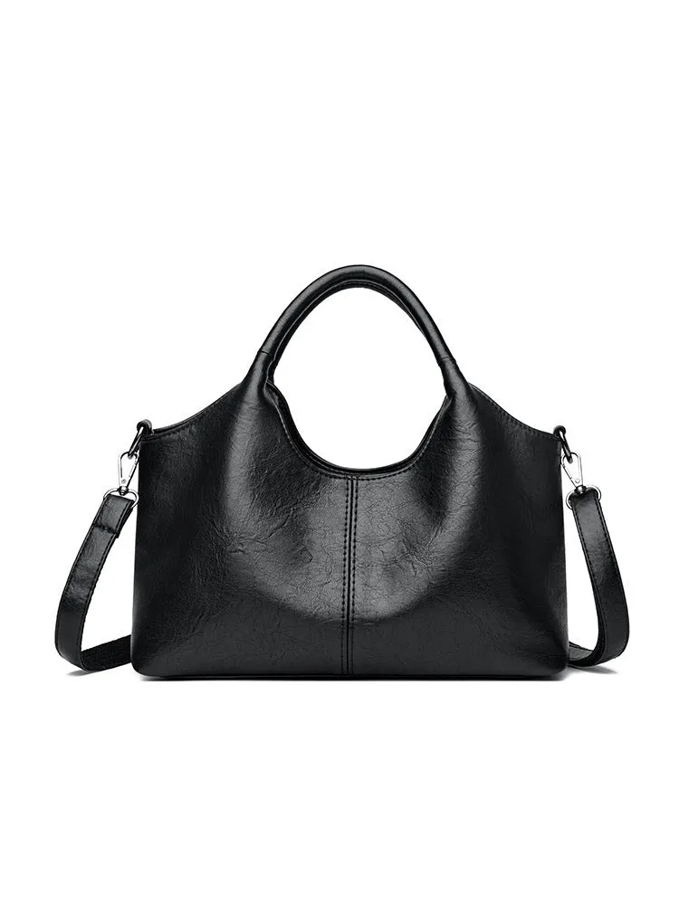 Genuine leather women's crossbody bag in beige colour showing large capacity design