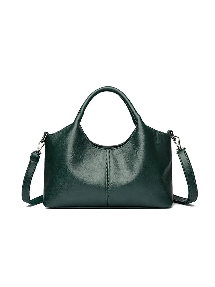 Genuine leather women's crossbody bag in beige colour showing large capacity design