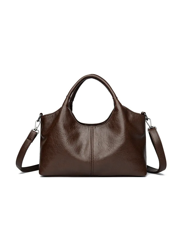 Genuine leather women's crossbody bag in beige colour showing large capacity design