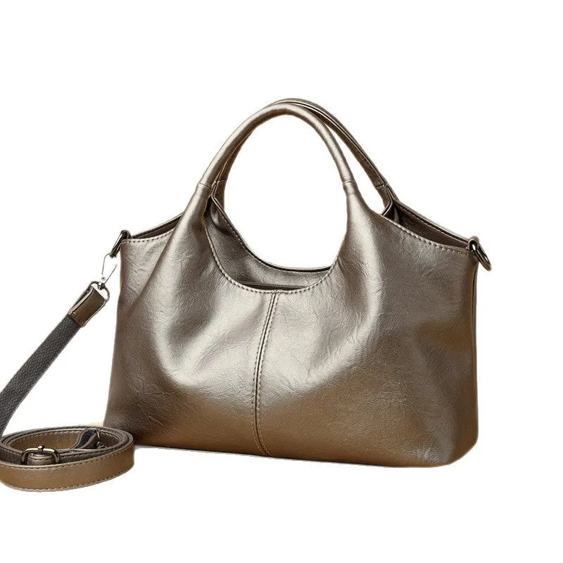 Genuine leather women's crossbody bag in beige colour showing large capacity design