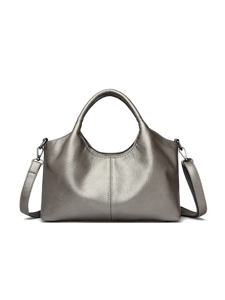 Genuine leather women's crossbody bag in beige colour showing large capacity design