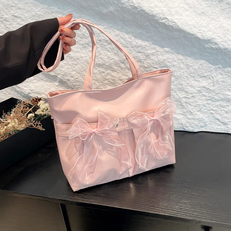 College style bow tote bag in black with large capacity and double shoulder straps