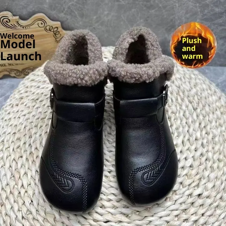 Women's winter slip-on ankle boots with round toe, low platform heel, in black synthetic leather with stitching detail