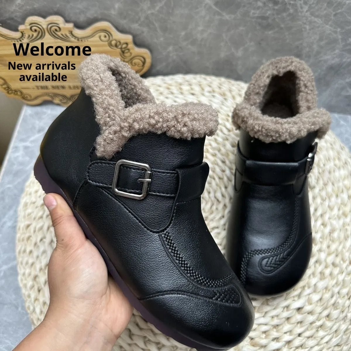 Women's winter slip-on ankle boots with round toe, low platform heel, in black synthetic leather with stitching detail