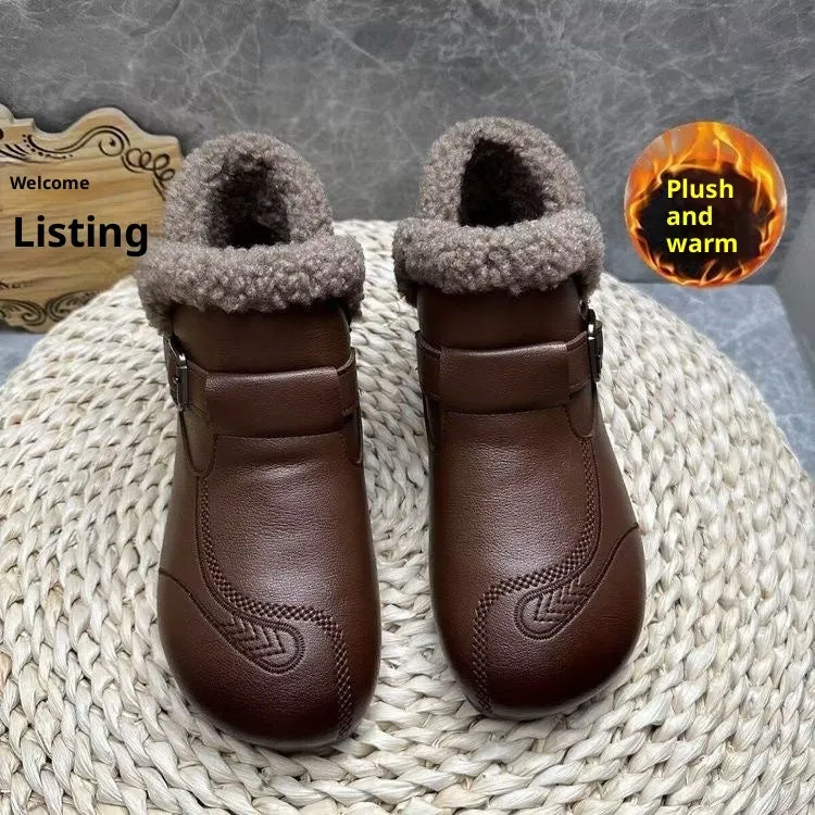 Women's winter slip-on ankle boots with round toe, low platform heel, in black synthetic leather with stitching detail