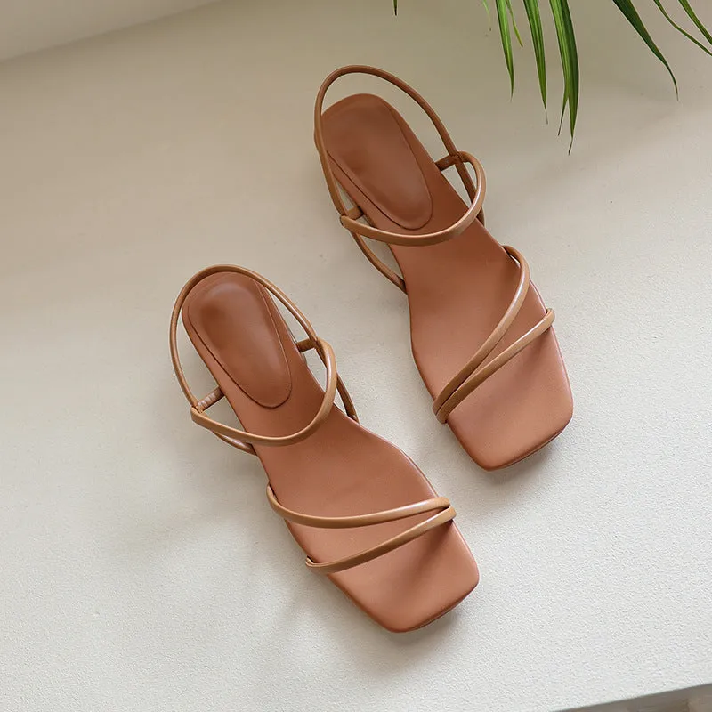 Women's flat strap gladiator sandals with square toe and adjustable ankle ties in beige.