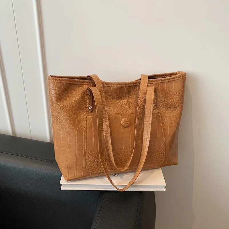 Retro large capacity single-shoulder handbag in soft PU with stitching details, available in black, tan, brown, coffee colours