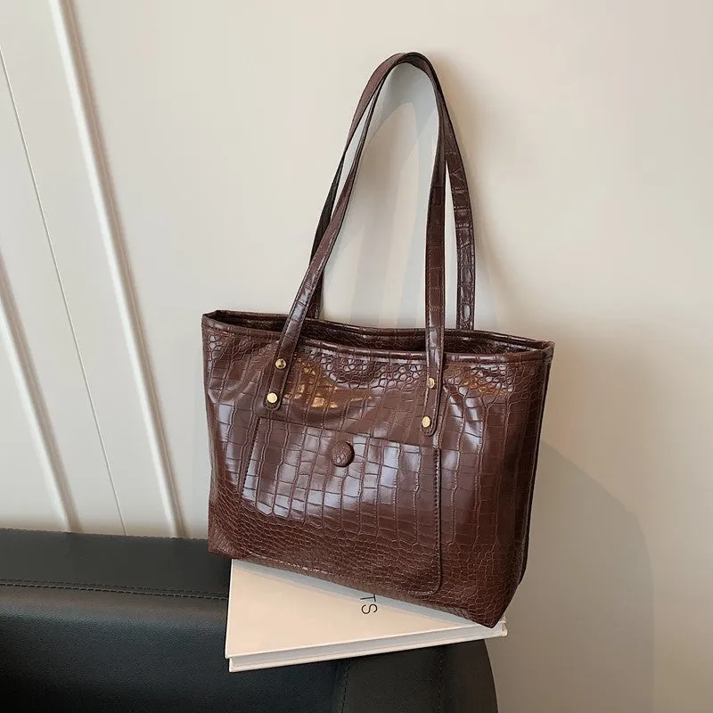 Retro large capacity single-shoulder handbag in soft PU with stitching details, available in black, tan, brown, coffee colours