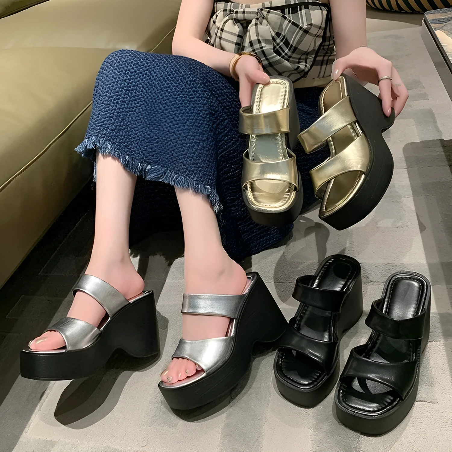 Women's black wedge platform slippers with square toe on a white background.