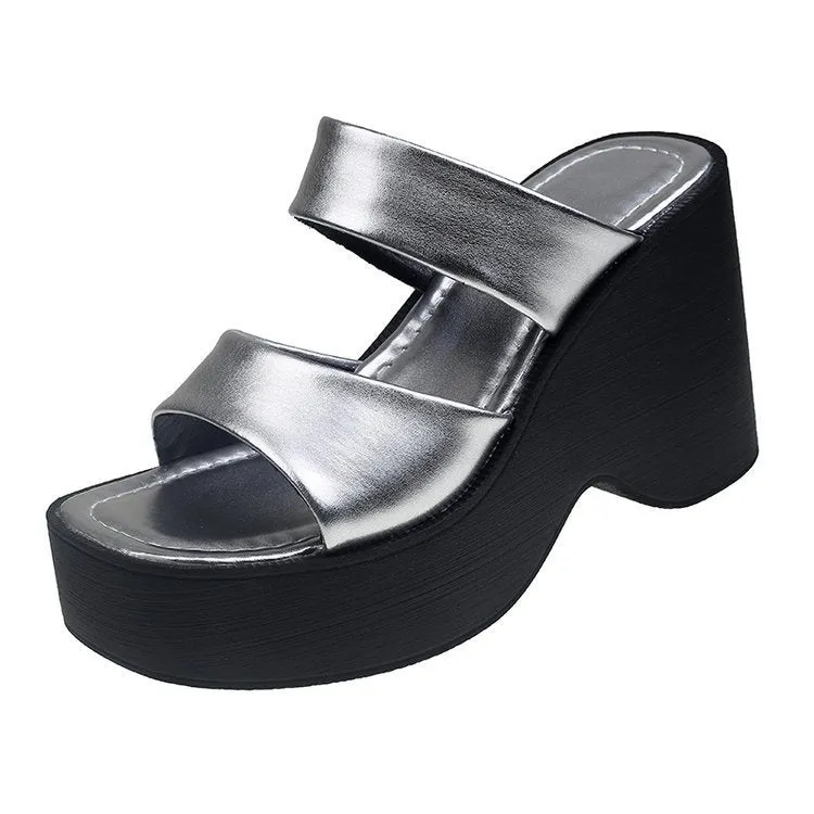 Women's black wedge platform slippers with square toe on a white background.