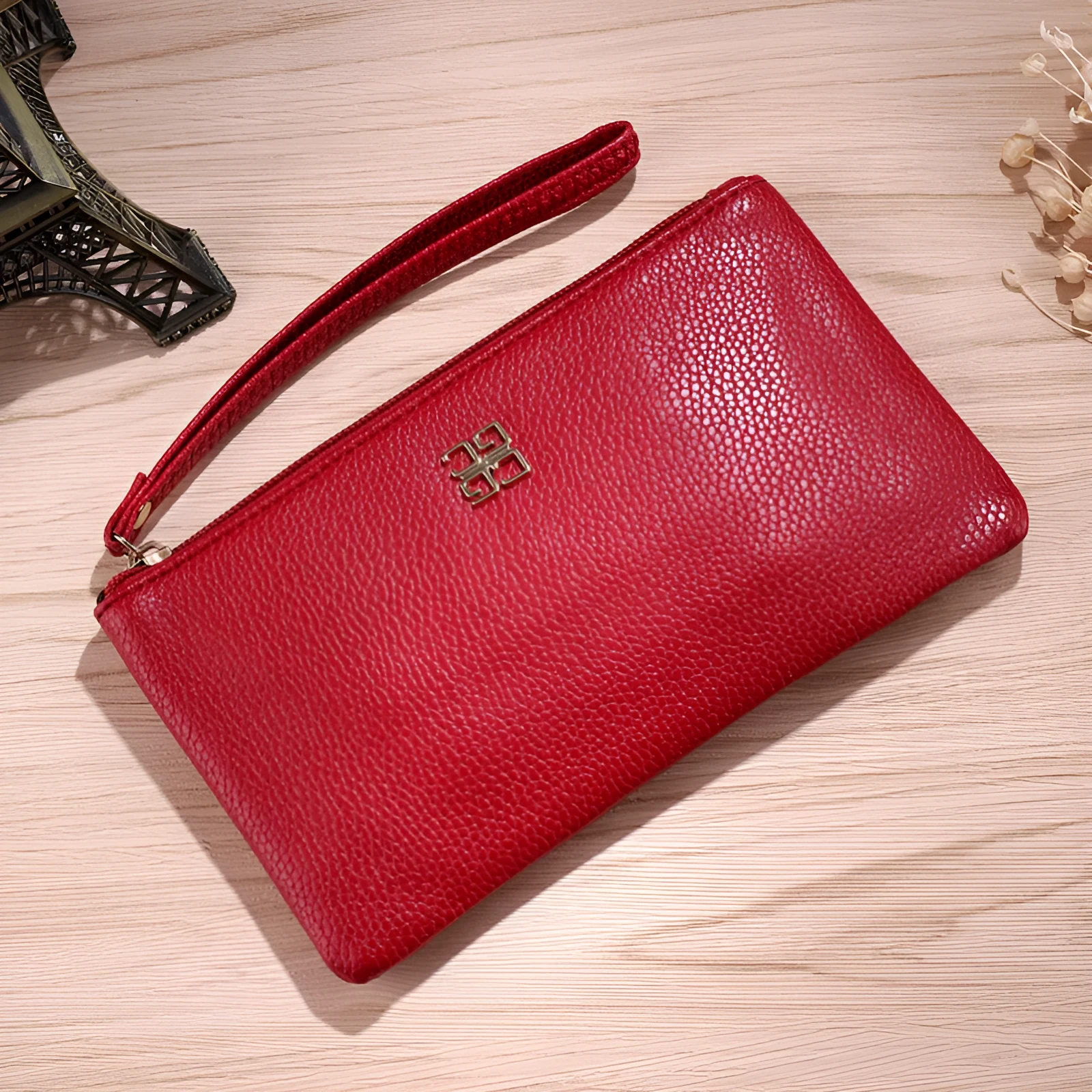 Long 55-inch PU leather zip wallet handbag in a solid colour with sewing line detail.