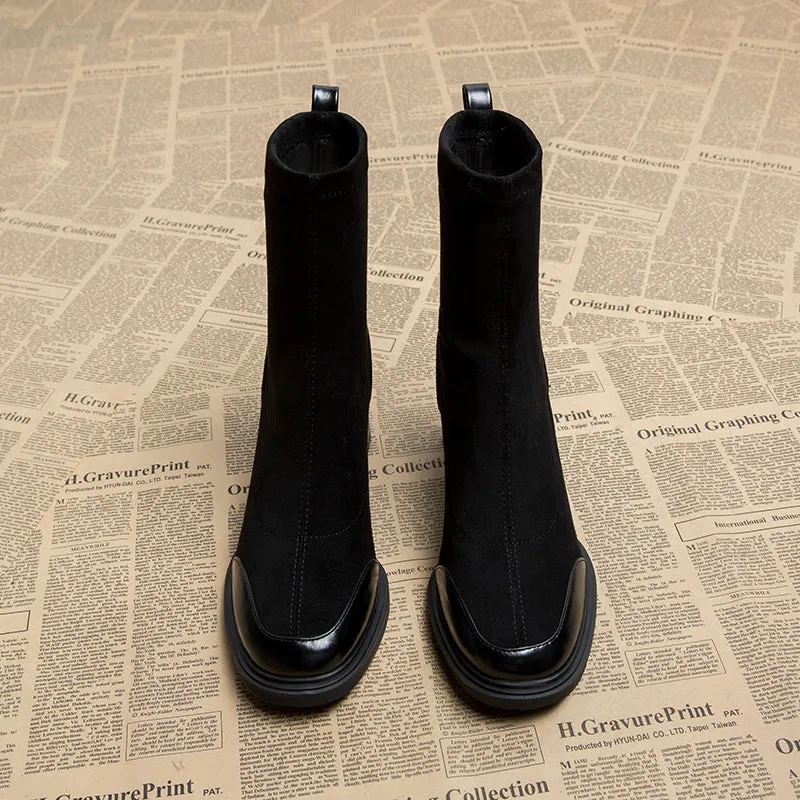 Genuine leather women's short martin boots in black matte finish with high heel and rubber sole