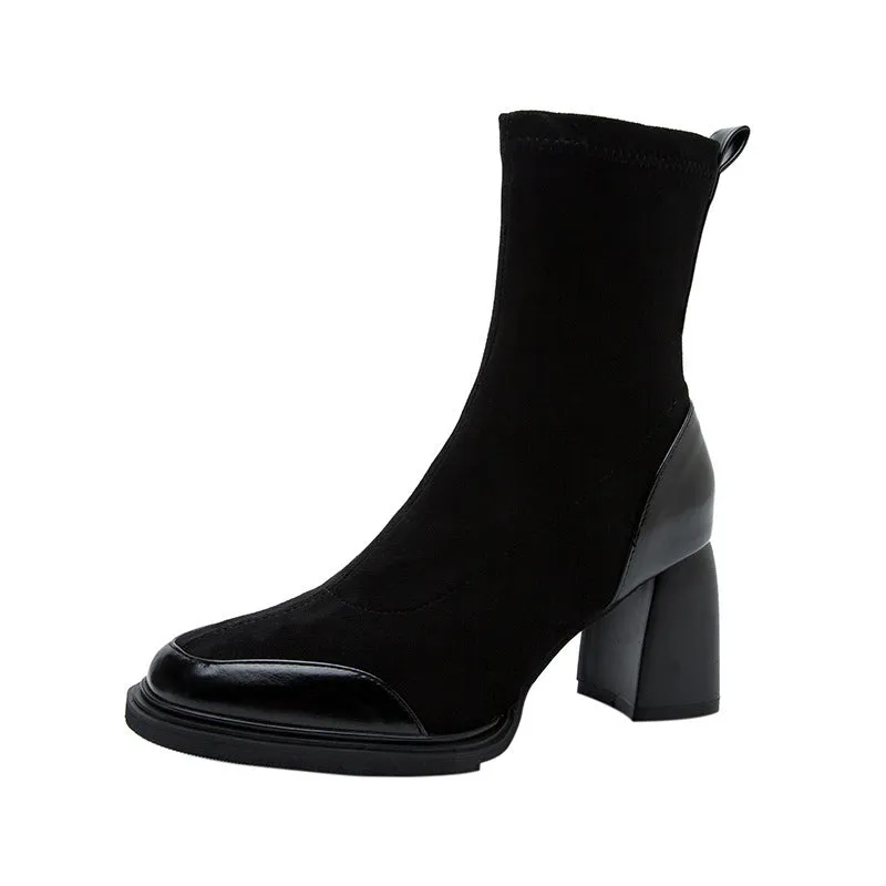 Genuine leather women's short martin boots in black matte finish with high heel and rubber sole