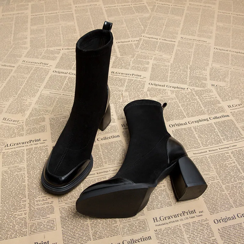 Genuine leather women's short martin boots in black matte finish with high heel and rubber sole
