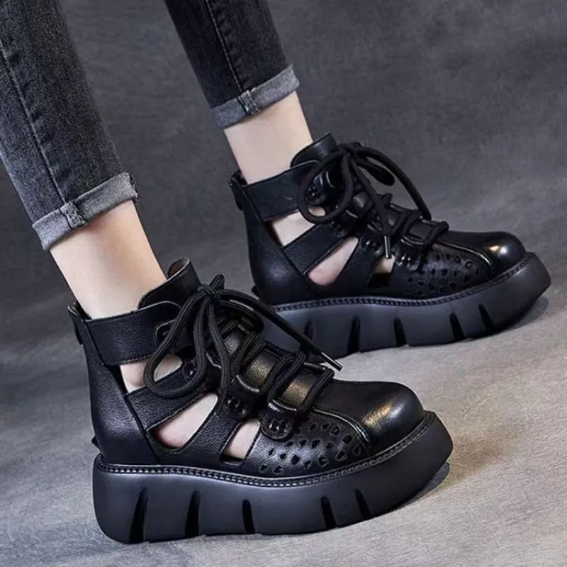 Women's black platform sandals with fish mouth toe and hollow hole design on plush upper