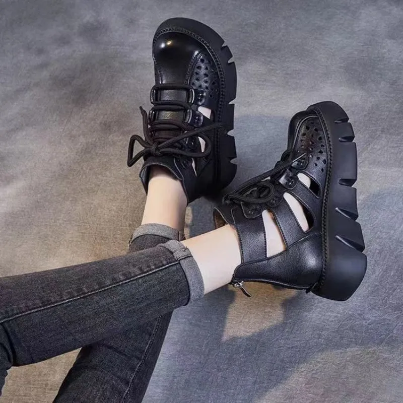 Women's black platform sandals with fish mouth toe and hollow hole design on plush upper