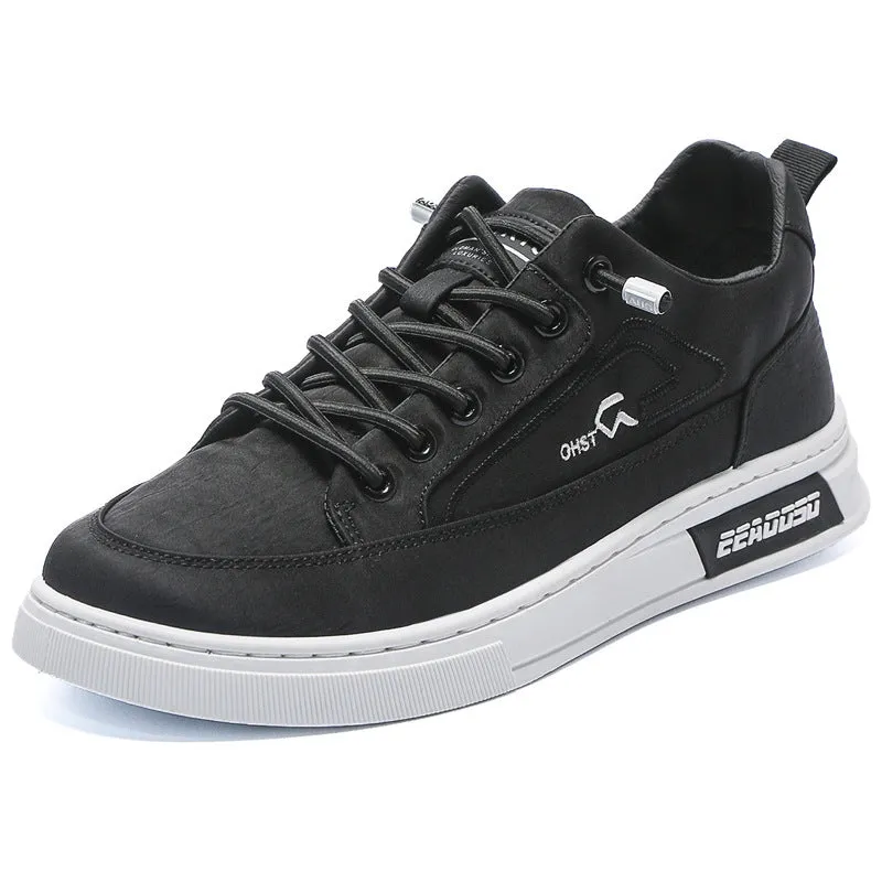 Grey men's canvas casual shoes with round toe and front lace-up design