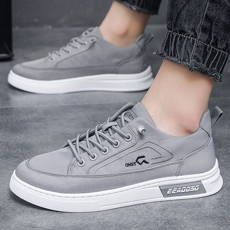 Grey men's canvas casual shoes with round toe and front lace-up design