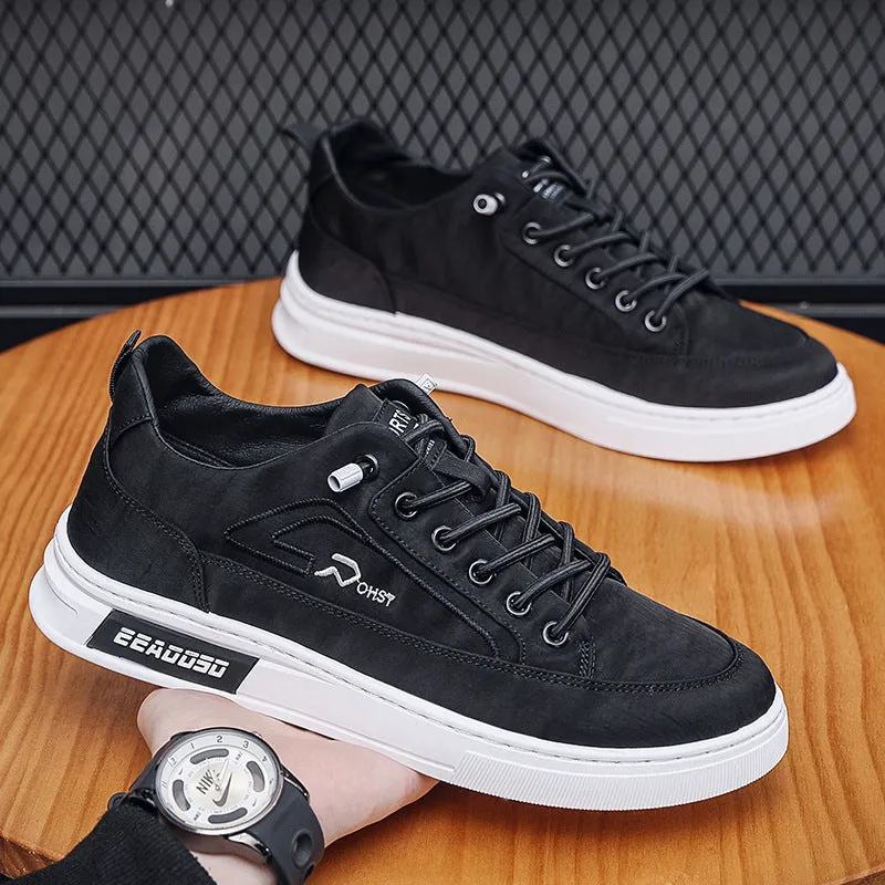 Grey men's canvas casual shoes with round toe and front lace-up design
