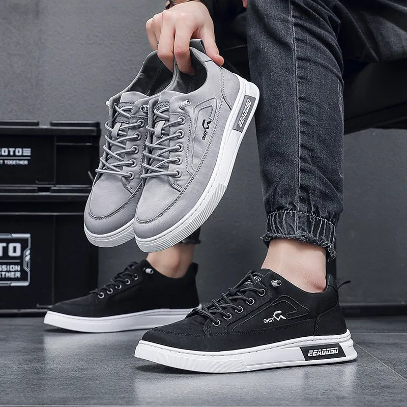 Grey men's canvas casual shoes with round toe and front lace-up design