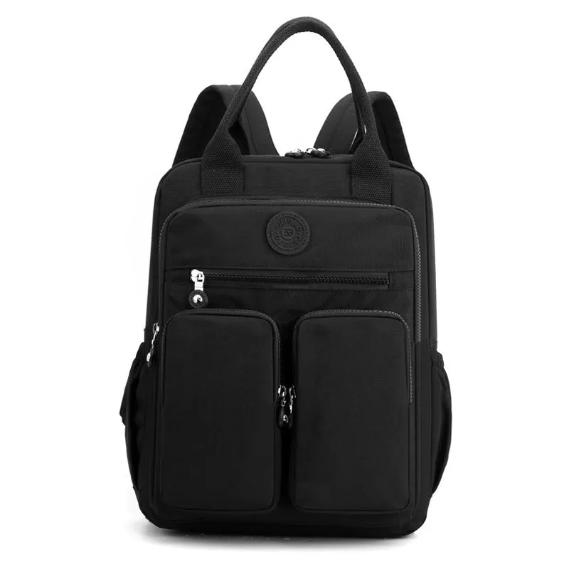 Large soft nylon waterproof backpack in grey, open to show internal laptop, camera, and phone compartments.