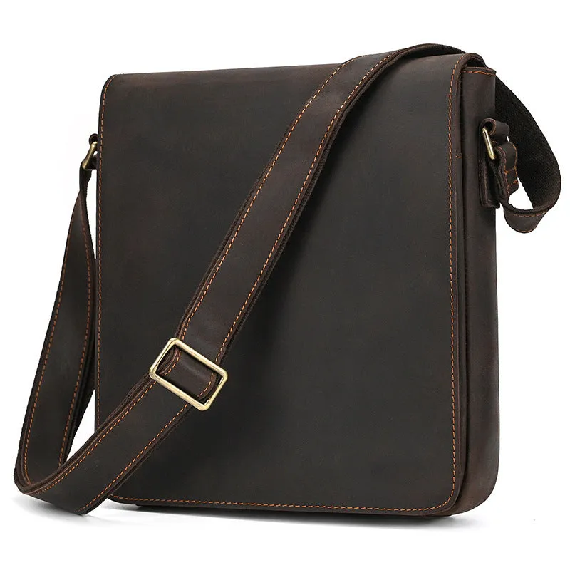 Men's brown leather shoulder bag with flip shoulder strap showing sewing line details and retro design