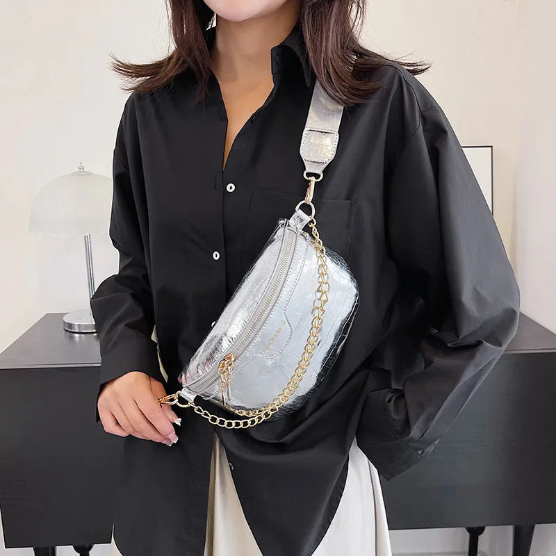 Shiny PU chest bag with chain shoulder strap available in silver colour