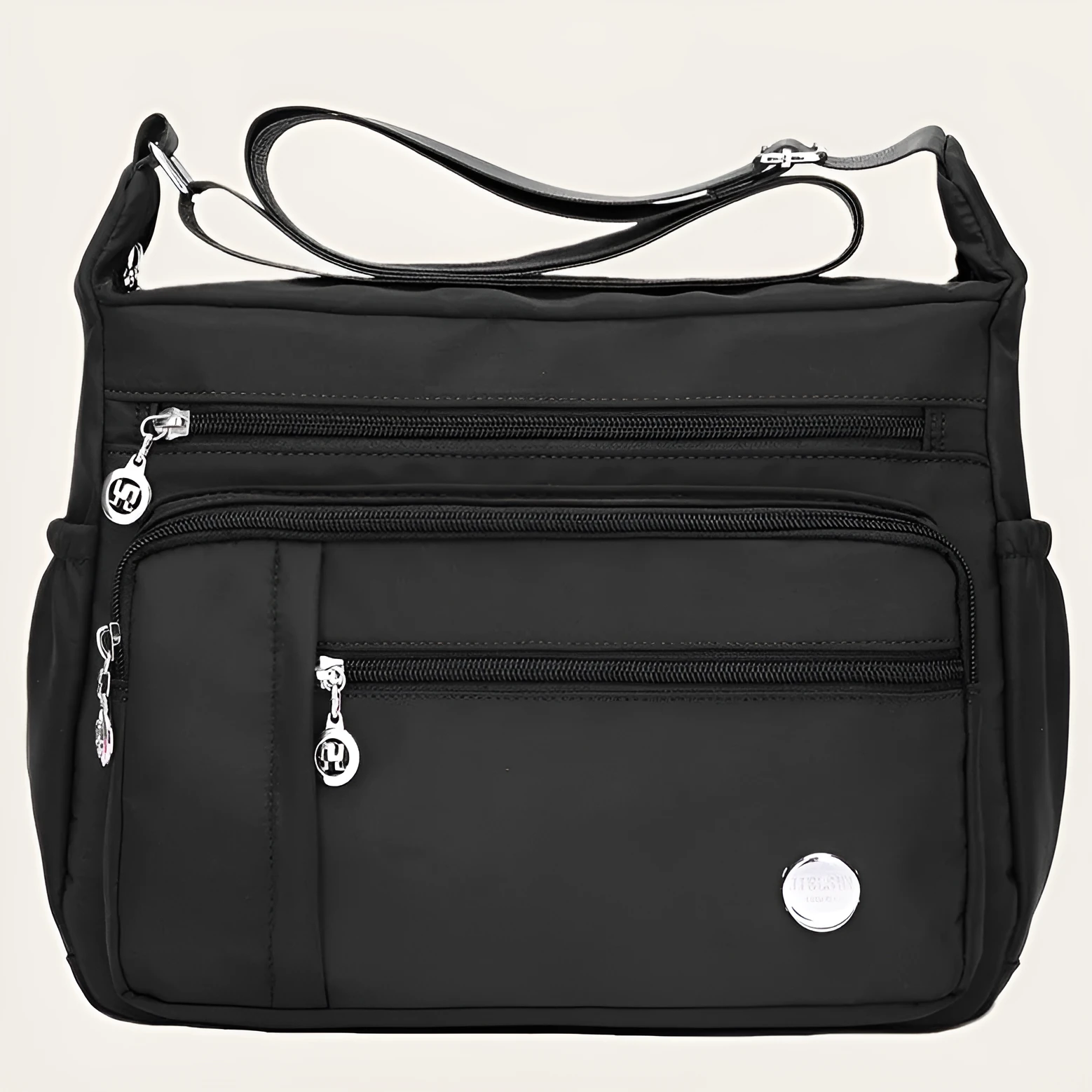 Lightweight nylon women's one shoulder crossbody bag in black with horizontal square shape and visible sewing thread detail