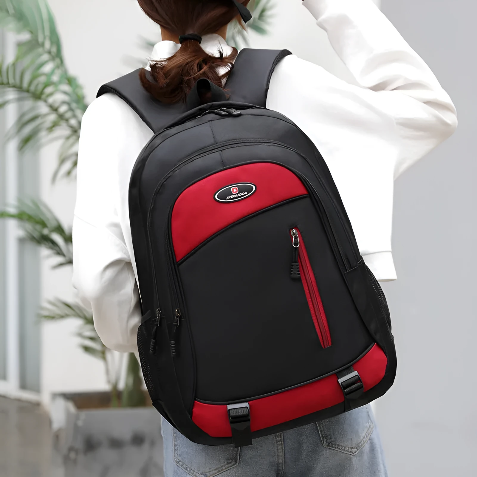 A high school student's nylon backpack with air pillow straps in black, red, blue, or grey colours.