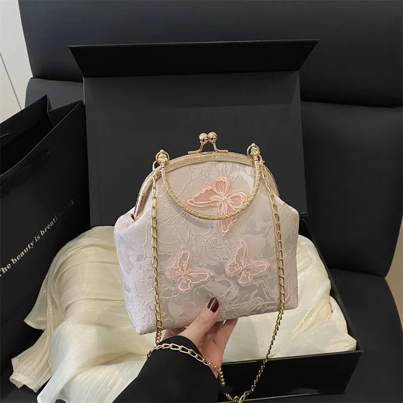 Women's fabric embroidered chain retro messenger bag in bucket shape, soft material, single shoulder strap, colour black