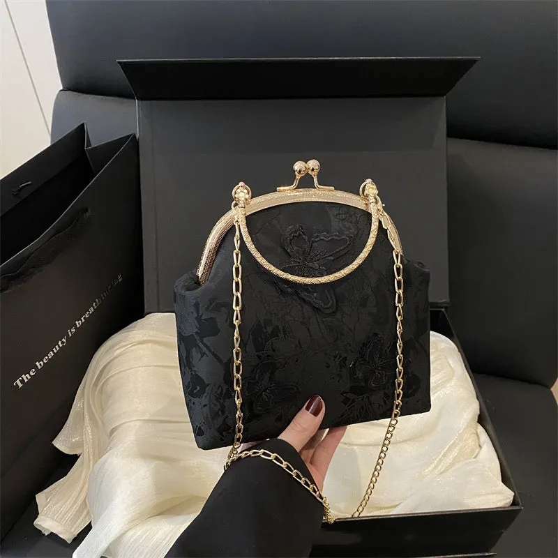 Women's fabric embroidered chain retro messenger bag in bucket shape, soft material, single shoulder strap, colour black